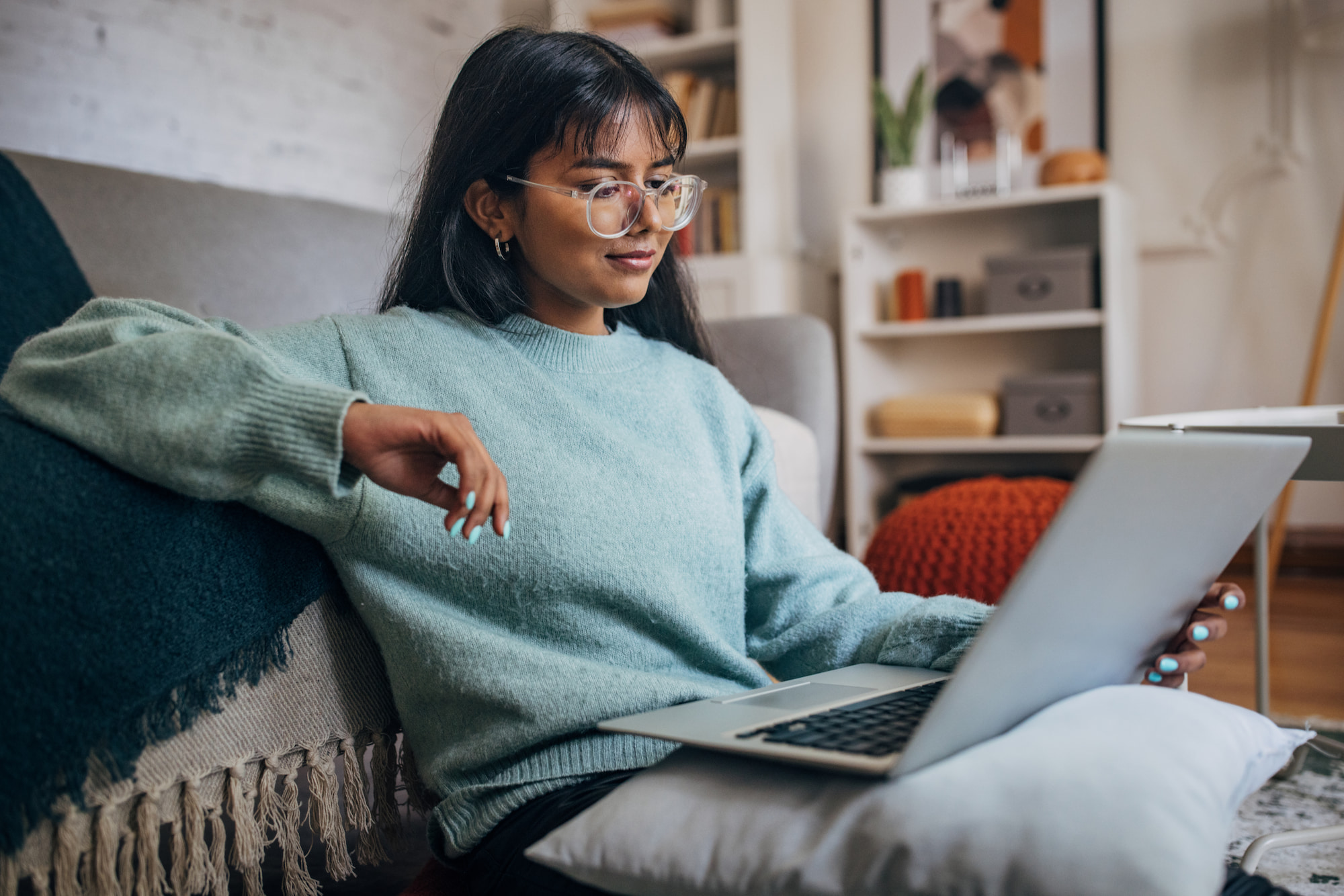 Young adult female on computer